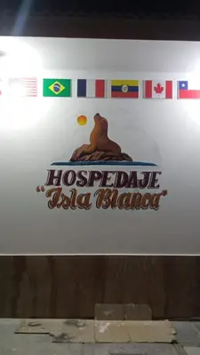 a sign with a hos preparedridge usa blazed at ALOJAMIENTO ISLA BLANCA in Paracas