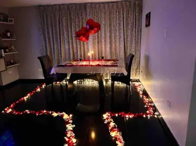 a dining room with a table with a cake and christmas lights at Espacio para ti y tu familia in Lima