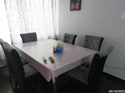 a pink table with chairs around it in a room at Espacio para ti y tu familia in Lima