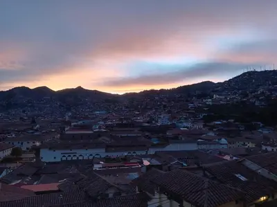 a view of a city with houses and mountains at Casa Cusco guest house in Cusco
