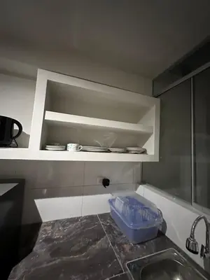 a kitchen with a sink and a bowl on a counter at Dpto a 3 min Plaza Huánuco y 1 cuadra Open Plaza in Huánuco