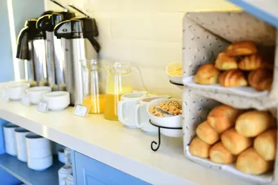 a shelf with bread and other items on it at Tandapata Boutique Hotel in Cusco
