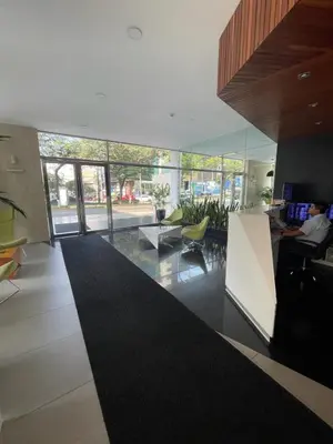 a living room with a large black rug at Gorgeous 2BDRM with A/C - Miraflores in Lima
