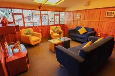 a living room with couches and chairs and tables at WARM AND CENTRAL HOUSE WITH SPECTACULAR VIEW OF CUSCO in Cusco