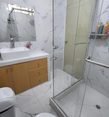 a bathroom with a shower and a toilet and a sink at CASA CULTURA in Lima