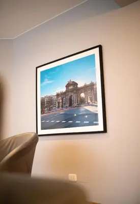 a picture of a building on a wall at Beautiful 2BR in Miraflores in Lima