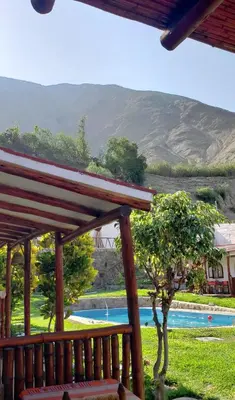 a view of a pool from the porch of a house at La Fortaleza del Inca in Lunahuaná