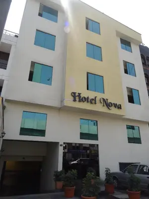 a hotel nova building with a sign on it at Hotel Nova in Lima
