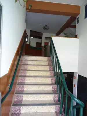 a flight of stairs in a building at Hotel Nova in Lima
