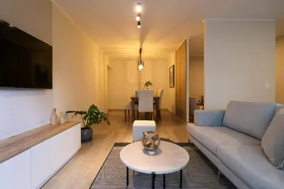a living room with a couch and a table at Soul by Wynwood House in Lima