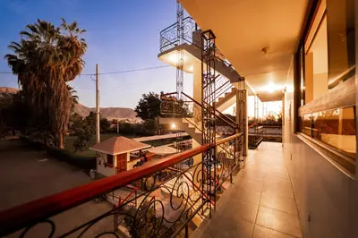 a balcony of a building with a view of the desert at Hotel Fundo San Rafael in Nazca