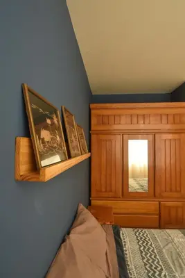 a bedroom with a bed and a window at Casa mar surfhouse in Punta Hermosa