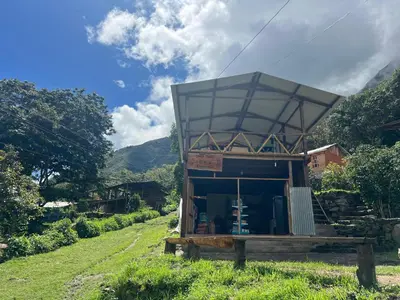 a small house with a glass roof on top of it at Eco Inca Trail Lodge Lucmabamba in Cusco