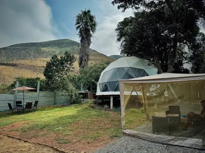 a person sitting in a chair in a tent at Amaya Experience in Miraflores