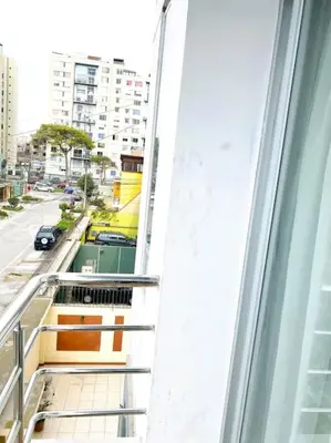 a balcony with a view of a city street at Sai in Lima