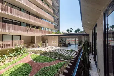 an external view of a building with a courtyard at Miraflores Centre Boutique Apartment 101B in Lima