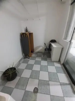 a room with a checkered floor and a window at Just for me in Lima