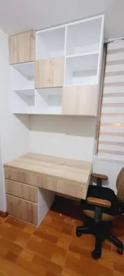 a desk with a chair in a room at Departamento cerca al Centro Histórico de Lima in Lima
