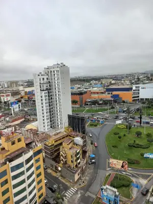 an aerial view of a city with tall buildings at Casa Linda San Miguel in Lima