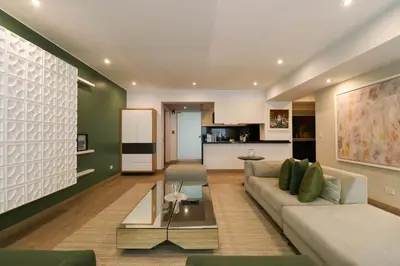 a living room with a couch and a table at Mimosas 161 by Wynwood House in Lima