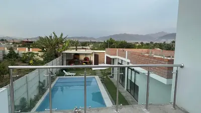 a view of a balcony with a swimming pool at Casa de Campo Aucallama in Huaral
