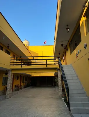 an empty hallway of a building with a staircase at Hotel Alicia in El Puente