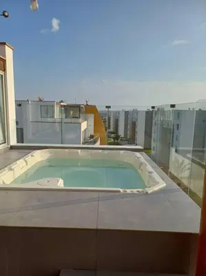 a hot tub on top of a building at Gaviotas de Paracas in Paracas