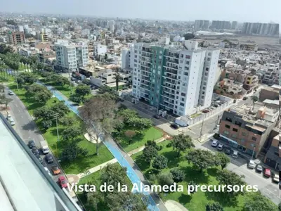 an aerial view of a city with tall buildings at San Miguel Rooms Lima Airport B&B in Lima