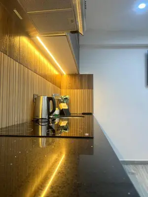 a kitchen with a coffee pot on a counter at Lama Vista Living 201 in Cusco