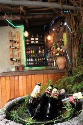 a group of beer bottles sitting on a table at Casa Jazmín Hospedaje Familiar Eco Amigable - Huayoccari, Sacred Valley in Huayoccare