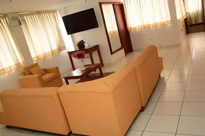 a living room with a couch and a table at Incasol Tower 