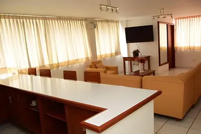 a living room with a couch and a table at Incasol Tower 