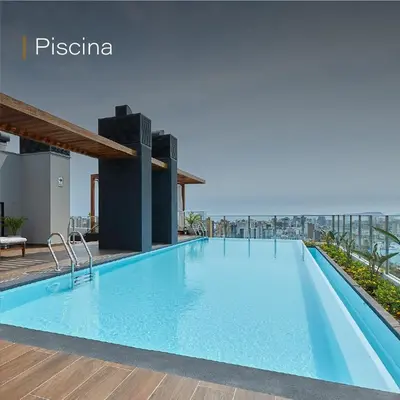 a swimming pool on the roof of a building at Deluxe Aparment San Isidro in Lima