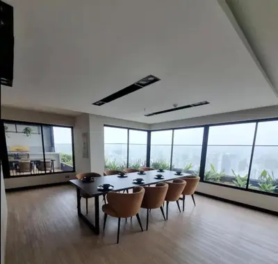 a large dining room with a table and chairs at María Paz Home in Lima
