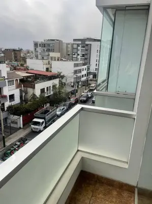an empty balcony with a view of a city at Departamento en Miraflores, Lima in Lima