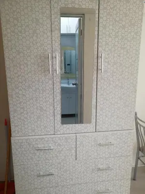 a white dresser with a mirror in a bathroom at ESTUDIO COMPLETO en el CENTRO HISTORICO de LIMA in Lima