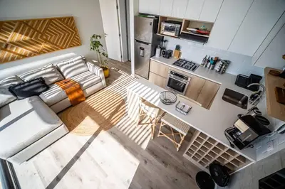 an overhead view of a living room and kitchen at Aldea 1BR Penthouse wtih Private Pool and Views for 2 in Paracas
