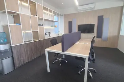 an office with a desk and chairs in an office at Aldea 2BR TVs, KamadoBBQ for 6, Gym,Pool and Cowork in Paracas