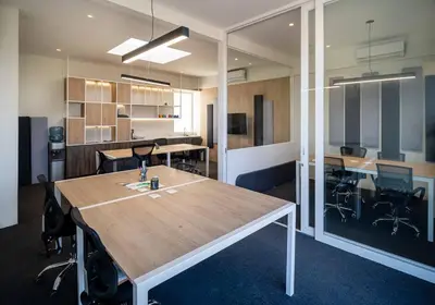 an office with a table and chairs in a room at Aldea 2BR Ocean View and Kamado BBQ for 6 in Paracas