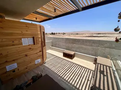 a room with a view of the desert at Aldea 2 Bedroom with Private Sauna for 4 in Paracas