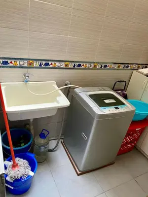 a bathroom with a toilet and a sink at Omi's Room 2 in Lima