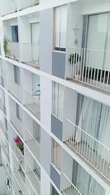 a facade of a building with balconies at Alquiler de habitación en un bonito y cálido departamento muy bien ubicado en Barranco in Lima