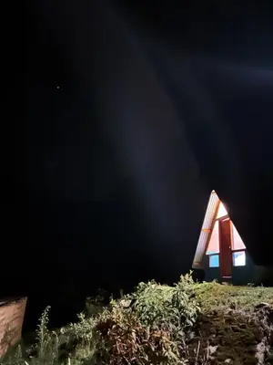a house on a hill with a beam of light at Salkantay Lodge Collpapampa in Colcapampa