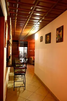 a dining room with a table and chairs at Gran Olivar Suite de San Isidro -3 Habitaciones in Lima