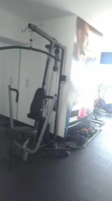 a room with a gym with a man on the wall at Barranco-Miraflores, ubicación A1, hermosa vista in Lima