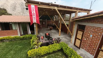 an overhead view of a patio of a house with a flag at Taypu bungalow in Lunahuaná