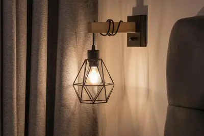 a light hanging from a wall with a curtain at Modern loft in front of the boardwalk and the sea in Lima
