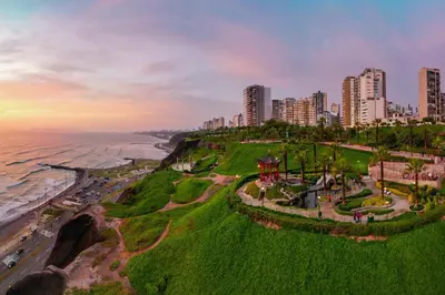 an aerial view of a city and the ocean at Private room by the sea Miraflores in Lima