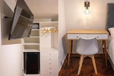 a small bedroom with a desk and a chair at Private room by the sea Miraflores in Lima
