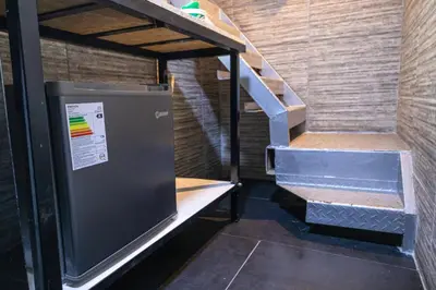 an empty staircase in a room with a stair case at Modern Duplex by the sea Miraflores in Lima